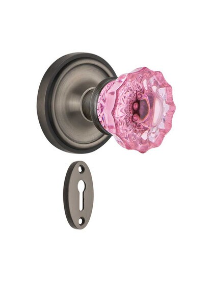Classic Rosette Mortise Lock Set with Colored Fluted Crystal Glass Knobs Pink in Antique Pewter.